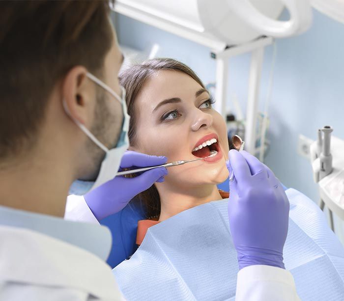 Mujer con dentista